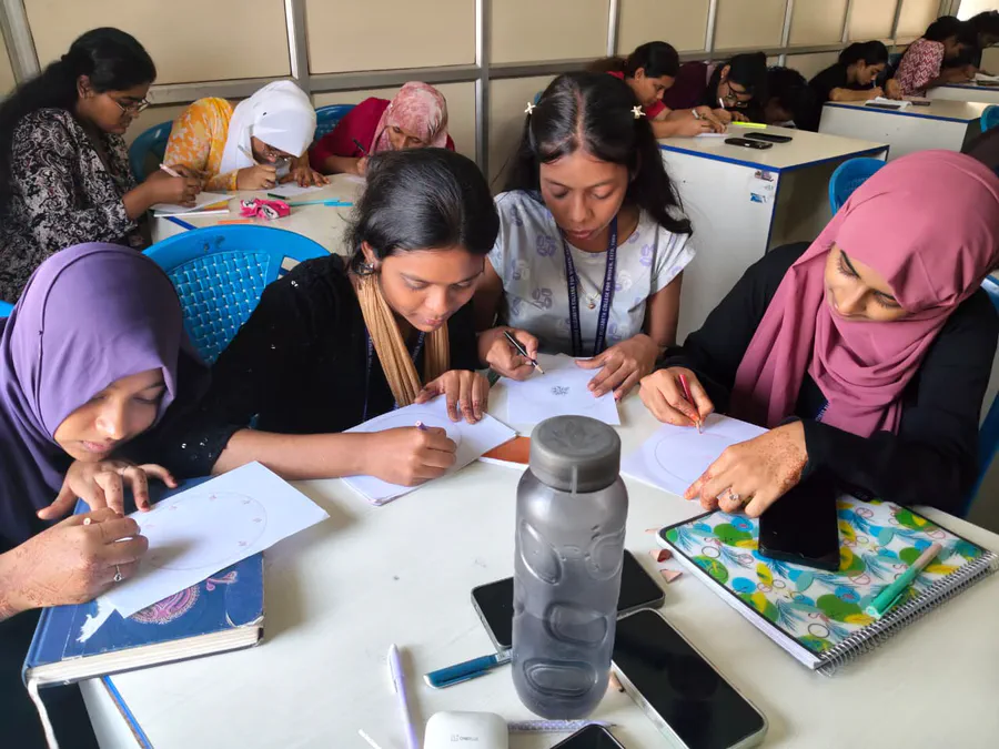 Students participating in the Dhruti PEERS activity 3